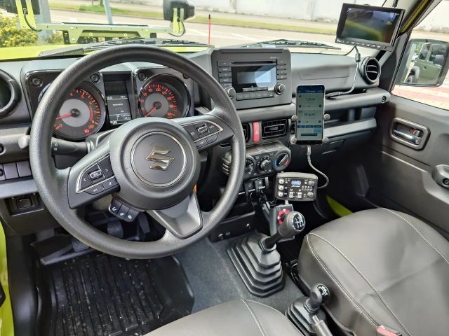 Suzuki Jimny PickUp Winterdienst-Umbau HILLTIP Schild & Streuer