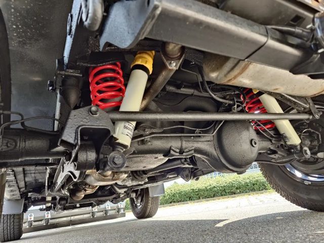 Suzuki Jimny PickUp Winterdienst-Umbau HILLTIP Schild & Streuer