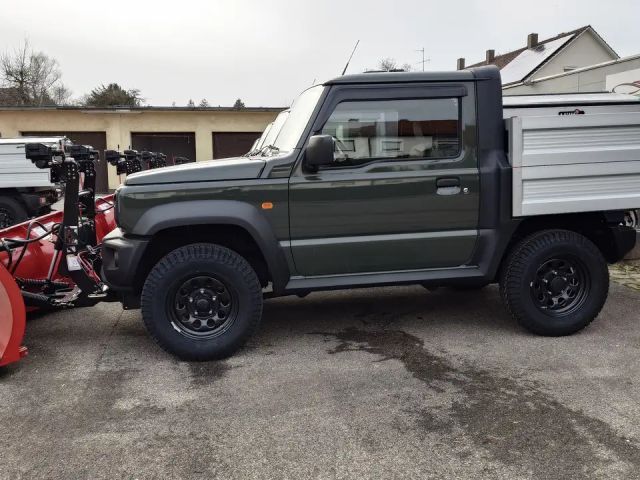 Suzuki Jimny PickUp Winterdienst mit Schneeschild und Streuer