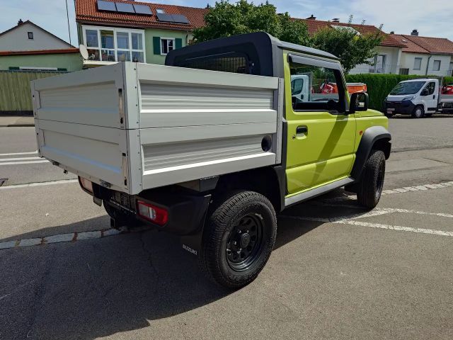 Suzuki Jimny PickUp Winterdienst-Umbau HILLTIP Schild & Streuer