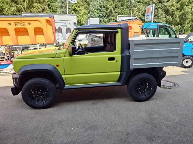 Suzuki Jimny PickUp Winterdienst-Umbau HILLTIP Schild & Streuer